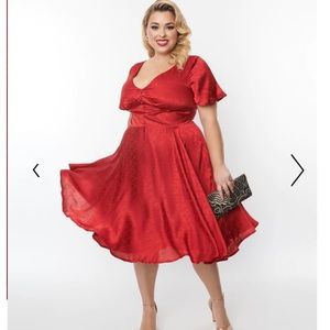 Brand new with tags Unique Vintage Satin Kaylee Swing Dress.